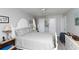 Inviting bedroom featuring a bed, dresser, and calming decor, perfect for relaxation and rest at 4726 Marine Pkwy # 201, New Port Richey, FL 34652