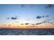 A beautiful sunset view over the ocean with colorful clouds and calm waters at 4726 Marine Pkwy # 201, New Port Richey, FL 34652