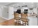 Bright eat-in kitchen featuring granite countertops, modern appliances, and ample cabinet space at 4837 Prince George Cir, New Port Richey, FL 34655