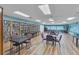 Community library featuring ample seating, extensive bookshelves, and tables for studying at 4837 Prince George Cir, New Port Richey, FL 34655