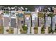 Aerial view of waterfront homes with private docks, pools, and well-manicured lawns on canal at 5106 Blue Heron Dr, New Port Richey, FL 34652