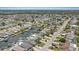 Expansive aerial view showcasing a charming waterfront neighborhood with interconnected canals at 5106 Blue Heron Dr, New Port Richey, FL 34652