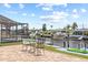 Inviting backyard with seating, waterfront views, pool and dock, perfect for outdoor living at 5106 Blue Heron Dr, New Port Richey, FL 34652