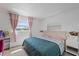 Bedroom with great natural light and soft decor elements at 5106 Blue Heron Dr, New Port Richey, FL 34652