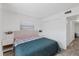 Well-lit bedroom features a cozy bed, closet, and neutral tones at 5106 Blue Heron Dr, New Port Richey, FL 34652
