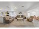 Open concept living room and kitchen featuring neutral tones and lots of space for entertaining at 5106 Blue Heron Dr, New Port Richey, FL 34652