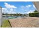 Waterfront home features a brick patio with a view of the canal at 5106 Blue Heron Dr, New Port Richey, FL 34652