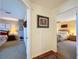 Charming hallway leading to bedrooms with view to bedroom on each side at 5198 Legend Hills Ln, Brooksville, FL 34609