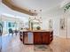 Spacious kitchen features a large island with stainless steel appliances and plenty of cabinet space at 5198 Legend Hills Ln, Brooksville, FL 34609