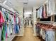 Spacious walk-in closet with organized shelving and ample hanging space for clothing and accessories at 5198 Legend Hills Ln, Brooksville, FL 34609