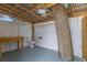 Outdoor bathroom with a sink, toilet, tree trunk, and corrugated metal roof at 7252 Coventry Ct, Weeki Wachee, FL 34607