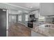 Updated kitchen featuring white cabinets, stainless steel appliances, and sleek countertops at 7252 Coventry Ct, Weeki Wachee, FL 34607
