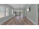 Spacious kitchen and dining area with modern floors, bright natural light, and an open layout perfect for gatherings at 7252 Coventry Ct, Weeki Wachee, FL 34607