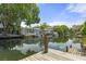 Beautiful waterfront view showcases calm waters, boat docks, and charming waterfront homes, ideal for boating enthusiasts at 7252 Coventry Ct, Weeki Wachee, FL 34607