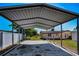 Covered carport area in backyard at 7321 Parrot Dr, Port Richey, FL 34668