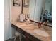 Bathroom vanity with granite countertop, offering a blend of style and functionality at 7508 Cypress Knee Dr, Hudson, FL 34667