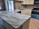 Well-appointed kitchen featuring sleek countertops and modern appliances, perfect for cooking and entertaining at 7508 Cypress Knee Dr, Hudson, FL 34667