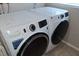 Side-by-side washer and dryer with easy to read digital displays at 7508 Cypress Knee Dr, Hudson, FL 34667