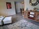 Open-concept living area featuring wood-look floors, neutral paint, and stylish furnishings at 7508 Cypress Knee Dr, Hudson, FL 34667