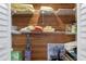 Cozy closet with cedar planking and white storage shelves at 8493 Belmont Rd, Spring Hill, FL 34606