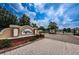 Lexington Commons gated entrance with decorative signage and landscaping at 8604 Corinthian Way, New Port Richey, FL 34654