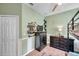Charming bedroom featuring stylish decor, two dressers, and a ceiling fan for added comfort at 8635 Creedmoor Ln, New Port Richey, FL 34654