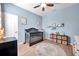 Charming Bedroom featuring a crib, a round rug, and decorative touches, perfect for a baby's room at 8635 Creedmoor Ln, New Port Richey, FL 34654