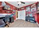 The second bedroom boasts a large closet, themed décor, and wood-look flooring; great as a room at 8635 Creedmoor Ln, New Port Richey, FL 34654