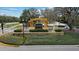 WatersEdge community entrance sign, featuring stone base and manicured landscaping at 8635 Creedmoor Ln, New Port Richey, FL 34654