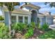 Well-maintained lawn and landscaping complement this charming single-story home at 8635 Creedmoor Ln, New Port Richey, FL 34654