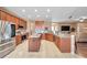 This kitchen features stainless steel appliances, a center island and a breakfast bar at 8635 Creedmoor Ln, New Port Richey, FL 34654