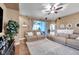 Inviting living room features comfortable seating and sliding glass doors for a seamless indoor-outdoor flow at 8635 Creedmoor Ln, New Port Richey, FL 34654