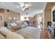 Spacious living room with an open floor plan and hardwood floors perfect for entertaining at 8635 Creedmoor Ln, New Port Richey, FL 34654