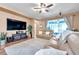 Living room with sofa and large window with access to the screened in patio at 8635 Creedmoor Ln, New Port Richey, FL 34654