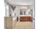 Luxurious main bathroom showcasing a separate shower and a soaking tub for relaxation at 8635 Creedmoor Ln, New Port Richey, FL 34654