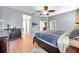 Well-lit and spacious main bedroom features an ensuite bathroom and generous closet space at 8635 Creedmoor Ln, New Port Richey, FL 34654