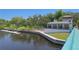 Scenic waterfront park in New Port Richey with a pier, gazebo, and lush greenery, ideal for leisure at 8635 Creedmoor Ln, New Port Richey, FL 34654