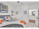 Bedroom with ensuite bathroom access, light walls and carpet at 8945 Bella Vita Cir, Land O Lakes, FL 34637
