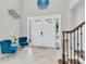 Bright foyer with high ceilings, tile flooring, and stylish decor, perfect for a warm welcome at 8945 Bella Vita Cir, Land O Lakes, FL 34637