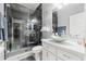 Modern bathroom with a glass-enclosed shower, a unique vessel sink, and stylish fixtures at 9078 Birmingham Ave, Weeki Wachee, FL 34613