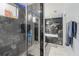 Modern bathroom showcasing a glass door shower with a view of a soaking tub at 9078 Birmingham Ave, Weeki Wachee, FL 34613