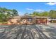 Charming home with a well-maintained exterior and a two-car attached garage at 9078 Birmingham Ave, Weeki Wachee, FL 34613