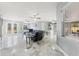 Bright living room with sleek marble floors and an open layout, perfect for entertaining and gatherings at 9078 Birmingham Ave, Weeki Wachee, FL 34613