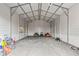 Metal building interior used for storing recreational vehicles and equipment on a gravel floor at 9078 Birmingham Ave, Weeki Wachee, FL 34613