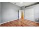 Bedroom featuring a large closet and a door leading to another room at 9104 Water Hazard Dr, Hudson, FL 34667