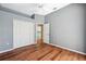 Bedroom featuring a large closet and a door leading to another room at 9104 Water Hazard Dr, Hudson, FL 34667