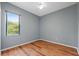 Bedroom featuring a large window that allows plenty of natural light to brighten the room at 9104 Water Hazard Dr, Hudson, FL 34667