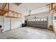 A well-lit garage with storage shelves at 9104 Water Hazard Dr, Hudson, FL 34667