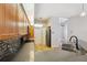 Well-equipped kitchen with stainless steel appliances, stone countertops, and ceramic backsplash at 9104 Water Hazard Dr, Hudson, FL 34667