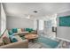 Comfortable living room with a neutral color palette, stylish furnishings, and an open-concept design at 9141 Greenbriar Ln, Port Richey, FL 34668